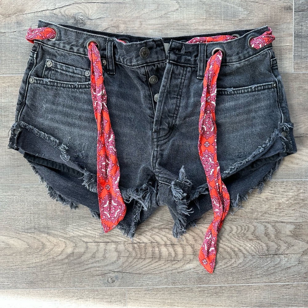 Free people We the Free black cutoff shorts with red tie belt size 27